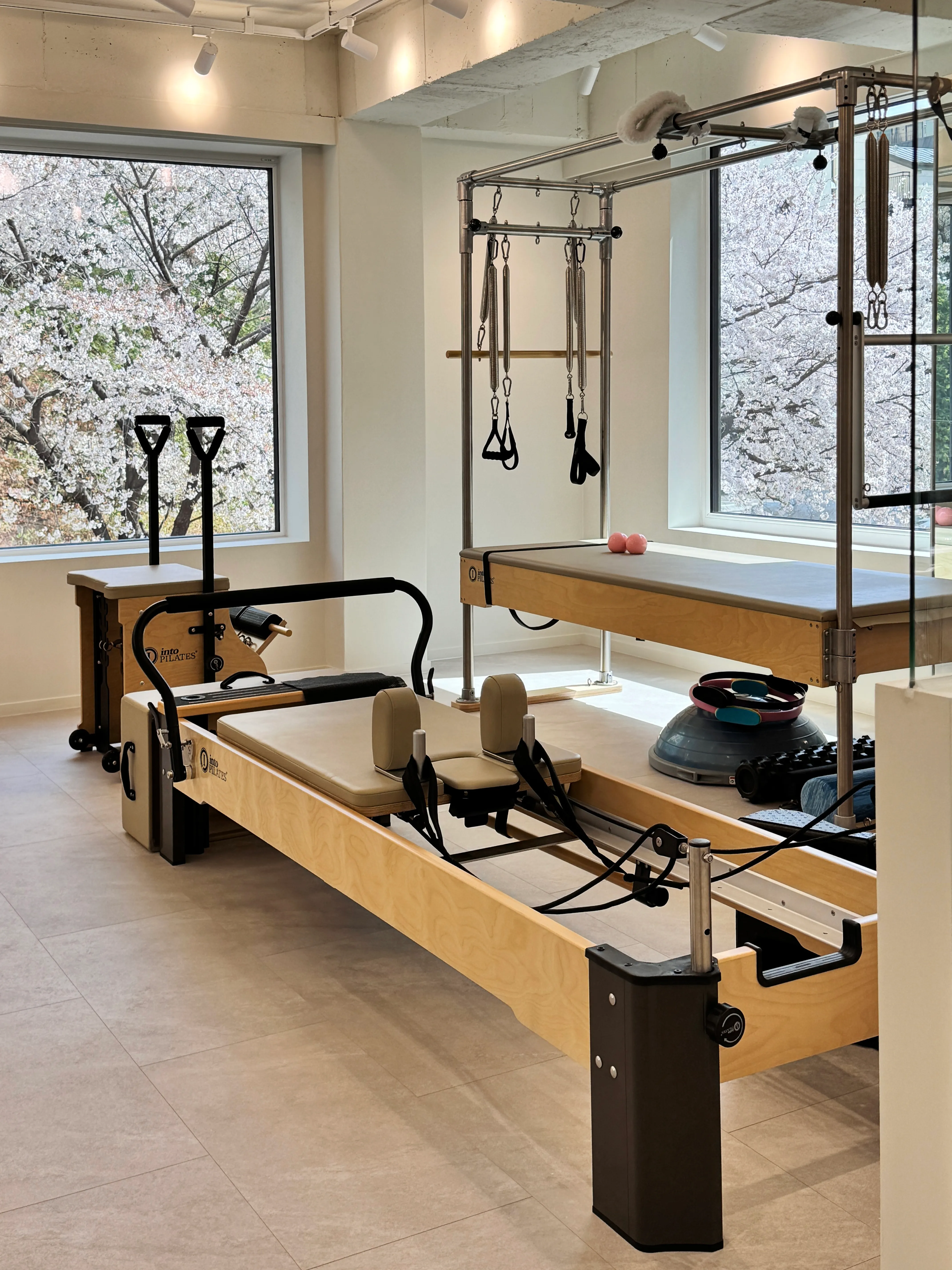 pilates studio with cherry blossom view